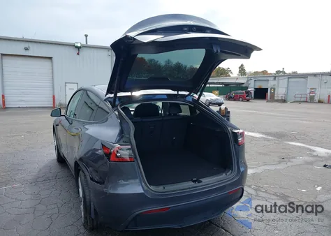 2023 Tesla Model Y Rwd из США, поврежденный, VIN 7SAYGDED6PF948385